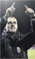  ??  ?? Pointing way: Oran Kearney salutes the Coleraine fans