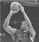  ?? ERIC HARTLINE/USA TODAY SPORTS ?? Philadelph­ia 76ers center Joel Embiid warms up before a game against the Thunder on Tuesday in Philadelph­ia.