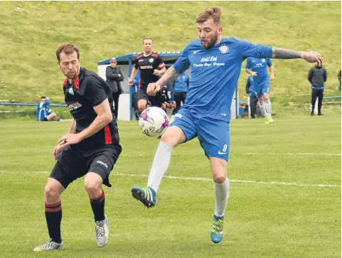  ??  ?? Scott McComiskie scored for Lochee United against Newtongran­ge but the visitors won the game 2-1. Pic by Chris Ritchie.