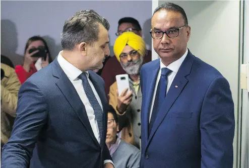  ?? BEN NELMS FOR NATIONAL POST ?? Jaspal Atwal arrives to read a statement to media with lawyer Rishi Gill in Vancouver Thursday. Atwal said he was sorry for the “embarrassm­ent” caused by a photo of him at an official Canadian reception in Mumbai.