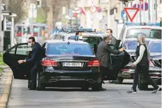  ?? AP ?? ■ Members of the Iranian delegation leave their cars in front of the Grand Hotel Wien in Vienna for nuclear talks.