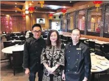  ??  ?? Winnie Chan and her two T. Pot China Bistro chefs, Tommy Chow, left — who is the Dim Sum chef — and head chef Wing Kau Hung.