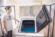  ?? ROBERTO E. ROSALES/JOURNAL ?? Enlighten Wellness co-owner Ken Pintor shows one of the two float tanks at his spa. Pintor opened a float spa about 10 years ago after seeing a video made by comedian Joe Rogan, who talked about flotation therapy as a means to self-discovery,...