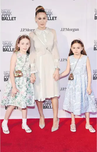  ?? STEVEN FERDMAN/GETTY IMAGES ?? Sarah Jessica Parker and her twins Marion Loretta Elwell Broderick, left, and Tabitha Hodge Broderick attend the New York City Ballet 2018 Spring Gala at Lincoln Center May 3 in New York City.