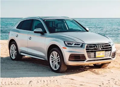  ??  ?? The Audi Q5 is tough to distinguis­h from its Q3 and Q7 brethren — not a bad thing when the vehicle looks this good.