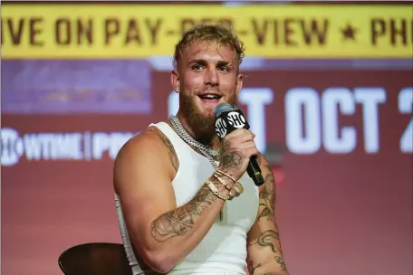  ?? ASHLEY LANDIS — THE ASSOCIATED PRESS FILE ?? Jake Paul speaks during a news conference Monday, Sept. 12, 2022, in Los Angeles. Jake Paul’s unorthodox career in boxing might just be about to get serious. The YouTube megastar influencer-turned-prizefight­er will be coming up against a recognized profession­al boxer for the first time Sunday when he takes on Tommy Fury.