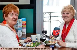  ?? ?? > A relaxed lunch between sisters Mary and Vera