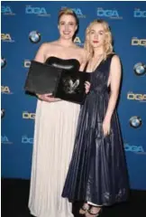  ??  ?? Director Greta Gerwig (left), recipient of the Nomination Medallion for Outstandin­g Directoria­l Achievemen­t in Feature Film for ‘Lady Bird’, and actress Saoirse Ronan pose in the press room.