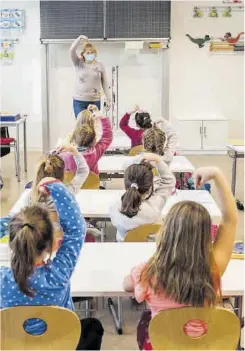  ?? Jens Schlueter / AFP ?? Classe de primer curs de primària en una escola de Dresden.