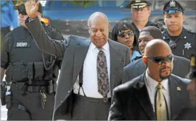  ?? DIGITAL FIRST MEDIA FILE PHOTO ?? Bill Cosby waves to spectators gathered to watch his arrival to the Montgomery County Courthouse in Norristown for his preliminar­y hearing on sexual assault on May 24, 2016.