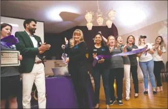  ?? NEWS-SENTINEL PHOTOGRAPH­S BY BEA AHBECK ?? Blue Ribbon personnel services’ Jenelle Lopez, third from left, cuts a ribbon as C&H Financial Service’s KarolAnn Osborn, far left, and Kanware Singh, second from left, and Blue Ribbon’s Katrina Quintero, center, and others cheer during the 2018 All...