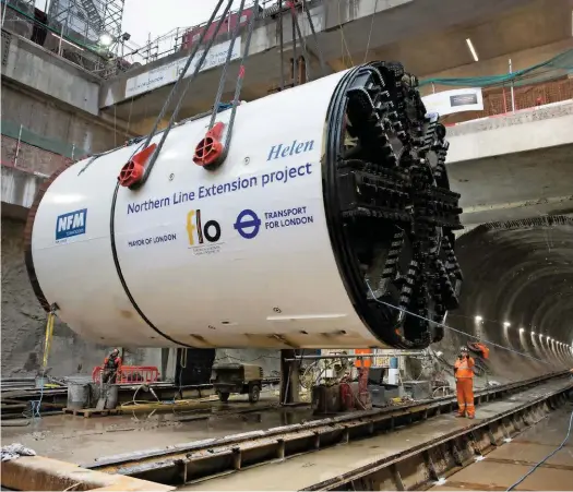  ?? TFL. ?? Tunnel Boring Machine Helen is lowered into a launch tunnel at Battersea on February 2, to begin tunnelling one of the twin bores that will form LU’s Northern Line Extension.