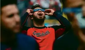  ?? MIKE LAWRIE/GETTY IMAGES ?? Gabriel Arias of the Guardians summed up the reaction to Monday’s total solar eclipse before Cleveland’s home opener.