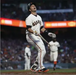  ?? NHAT V. MEYER — STAFF ?? The Giants’ Buster Posey reacts to lining out to end the fourth inning against the Padres.