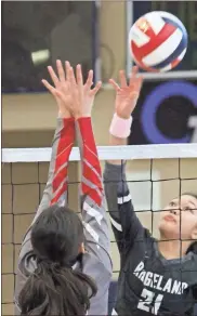  ?? Scott Herpst ?? Ridgeland’s Meagan Cordova looks to drop a shot over the top of a Southeast defender during a Region 7-AAAA firstround match at Heritage this past Thursday.