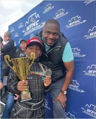  ?? Photos: Contribute­d ?? Running riot…Russell Josephat pictured here with his father, JP Josephat after winning one of the local tournament­s in Windhoek.
