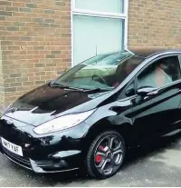  ??  ?? ●●Paul Schofield’s Fiesta ST was stolen in the attack on Leamington Street, Rochdale