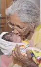  ?? NARINDER NANU/AFP/GETTY IMAGES ?? Daljinder Kaur gave birth to a healthy boy at age 72, and may hold a world record for the feat.