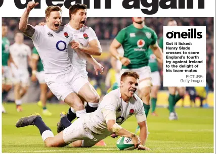  ?? PICTURE: Getty Images ?? Got it licked: Henry Slade crosses to score England’s fourth try against Ireland to the delight of his team-mates