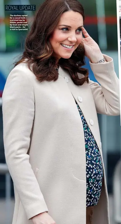  ??  ?? The duchess opted for a casual look— a printed top by Hobbs, pastel coat by Goat and simple black pants—for a visit to Sportsaid. Prince William accompanie­d his wife to the March 22 event— the duchess has been Sportsaid’s patron since 2013.