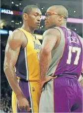  ?? Photo: Reuters ?? The Lakers’ Metta World Peace, left, stares down the Sun’s P J Tucker.