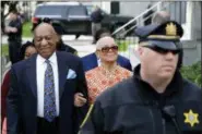  ?? MATT SLOCUM — THE ASSOCIATED PRESS FILE ?? In this file photo, Bill Cosby, left, arrives with his wife, Camille, for his sexual assault trial, at the Montgomery County Courthouse in Norristown.