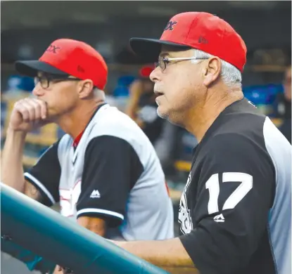  ?? GETTY IMAGES ?? Rick Renteria (with bench coach Joe McEwing) is being vague about the health scare that kept him away for four games.