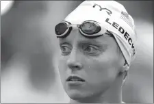  ?? LEE JIN-MAN/AP PHOTO ?? The United States’ Katie Ledecky reacts Monday after her 1500m heat at the World Swimming Championsh­ips in Gwangju, South Korea.