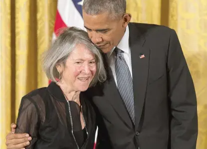  ?? AFP VIA GETTY IMAGES ?? Louise Glück, seen here receiving the 2015 National Humanities Medal from President Barack Obama, was awarded the Nobel Prize in Literature on Thursday.