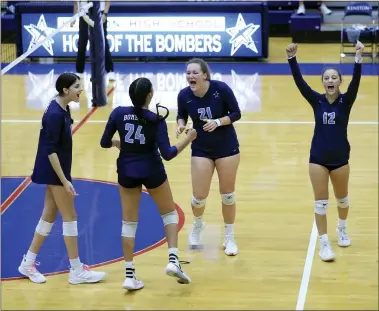  ?? TIM PHILLIS — FOR THE NEWS-HERALD ?? Kenston celebrates a point during its victory over Chardon on Oct. 12.