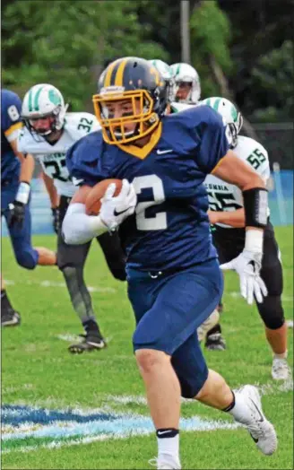  ?? PAUL DICICCO — THE NEWS-HERALD ?? Jake Neibecker, who was a quarterbac­k for six years in the Kirtland football program, has moved to fullback this year and is the team’s leading rusher through four games.