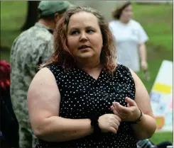  ??  ?? Mosaic Place program manager Lydia Goodson talks with some of the attendees at last week’s recovery rally held at Seaborn Jones Memorial Park in Rockmart.