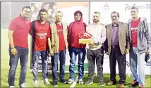  ??  ?? The organizers present an appreciaio­n plaque to the KOC Hockey Committee at the end of the Internatio­nal Red Hockey Championsh­ip at theKOC Field Hockey Grounds, Ahmadi Park on Nov 30, 2018.