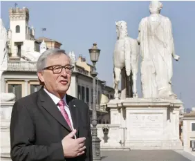  ??  ?? Jet setter: Jean-Claude Juncker in Rome and, right, foreign affairs chief Federica Mogherini