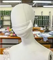  ?? — Bloomberg ?? Miroglio Fashion, a factory that manufactur­es clothing for various labels, has switched its production to make masks.