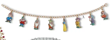  ??  ?? 3. An enamel and gold Art Deco charm bracelet by Cartier depicting Snow White and the Seven Dwarfs fetched $118,750 at Christie’s Magnificen­t Jewels sale in April, shattering its $20,000 high estimate. Photo credit: Christie’s