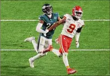  ?? Sarah Stier / Getty Images ?? Philadelph­ia’s James Bradberry is called for holding Juju Smith-schuster late in the Super Bowl’s fourth quarter.