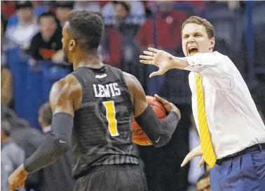  ??  ?? Former UTC coach and current Virginia Commonweal­th coach Will Wade shouts instructio­ns to guard JeQuan Lewis during the second half of a West Region first-round NCAA tournament game Friday against Oregon State in Oklahoma City.