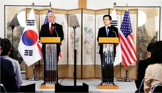  ??  ?? US Vice President Mike Pence speaks beside acting South Korean President and Prime Minister Hwang Kyo-ahn during a news conference in Seoul on Monday. (Reuters)