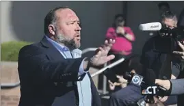  ?? Tyler Sizemore Hearst Connecticu­t Media ?? ALEX JONES is trying to limit the damages he has to pay after he was found liable for falsely saying that the 2012 Sandy Hook school massacre was a hoax.