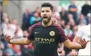  ?? ANDREW COULDRIDGE / REUTERS ?? Manchester City's Sergio Aguero celebrates scoring his side’s