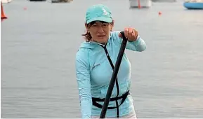  ?? PHOTO: CATRIN OWEN/ FAIRFAX NZ ?? Jan van der Linden has taken up paddle boarding as a form of rehabilita­tion after surviving breast cancer.