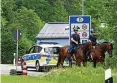  ?? AFP ?? Berittene Polizei patrouilli­ert in der Nähe von Elmau.