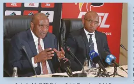  ??  ?? September (r) with PSL Chairman, Dr Irvin Khoza, at a media briefing.