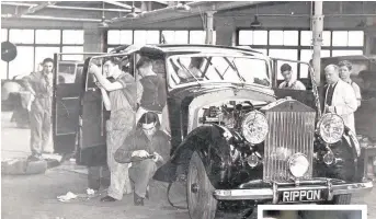  ??  ?? BEST IN SHOW Final touches at Rippon’s 1948 show car