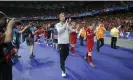  ?? Photograph: Tom Jenkins/The Guardian ?? Jürgen Klopp and the Liverpool players applaud their fans after their defeat in Kyiv.