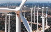  ?? Carolyn Mary Bauman / Fort Worth Star-Telegram file ?? Wind turbines rise from the West Texas plains near Big Spring. With a key federal tax credit fading, wind won’t be able to compete with cheap natural gas.