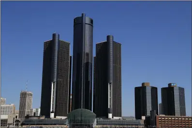  ?? (AP) ?? A general view of the Renaissanc­e Center headquarte­rs for General Motors, is shown along the Detroit skyline from the Detroit River in this file photo.