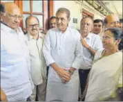  ?? PTI PHOTO ?? West Bengal chief minister Mamata Banerjee with NCP chief Sharad Pawar and other senior NCP leaders in New Delhi on Tuesday.