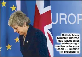  ??  ?? British Prime Minister Theresa May leaves after addressing a media conference at an EU summit in Brussels. AP